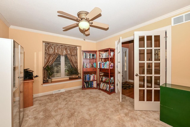 8940 Marie Ct, Mount Pleasant, WI 53406 - sitting room featuring french doors, ornamental molding, carpet floors, a ceiling fan, and baseboards