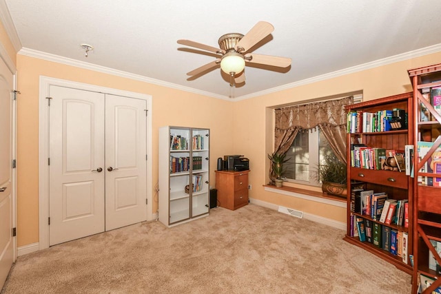 8940 Marie Ct, Mount Pleasant, WI 53406 - living area featuring crown molding, ceiling fan, carpet flooring, and baseboards