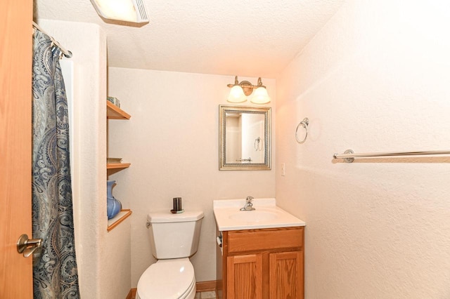 8940 Marie Ct, Mount Pleasant, WI 53406 - full bathroom with toilet, vanity, a textured ceiling, and a shower with curtain