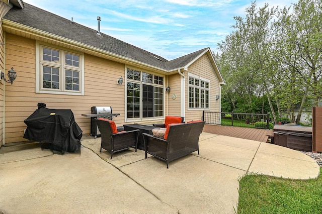 8940 Marie Ct, Mount Pleasant, WI 53406 - view of patio featuring a hot tub, an outdoor living space, grilling area, and a deck