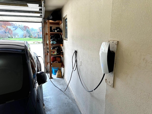 8940 Marie Ct, Mount Pleasant, WI 53406 - garage with a textured wall