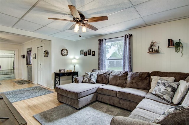 320 E Linden St, Chippewa Falls, WI 54729 - living room with ceiling fan, wood finished floors, a drop ceiling, and baseboards