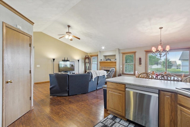 605 E Rime St, Orfordville, WI 53576 - kitchen featuring stainless steel dishwasher, vaulted ceiling, a chandelier, a ceiling fan, and dark wood-type flooring