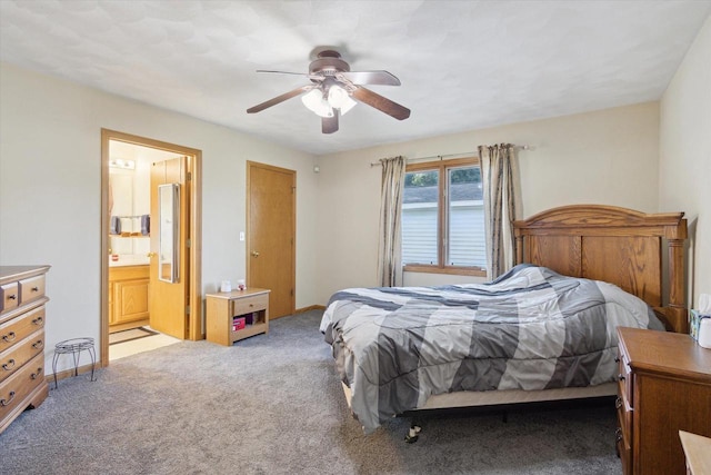 605 E Rime St, Orfordville, WI 53576 - bedroom featuring light carpet, connected bathroom, and a ceiling fan