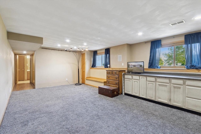 605 E Rime St, Orfordville, WI 53576 - below grade area featuring recessed lighting, carpet floors, and plenty of natural light