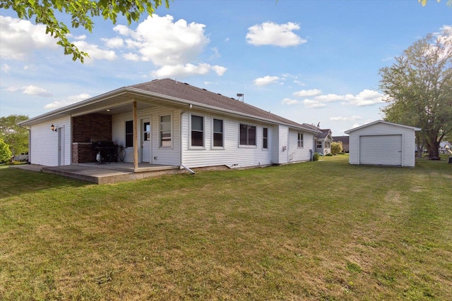 605 E Rime St, Orfordville, WI 53576 - back of house with a patio area, a yard, and an outdoor structure