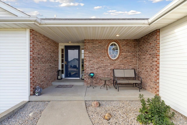 605 E Rime St, Orfordville, WI 53576 - property entrance with brick siding