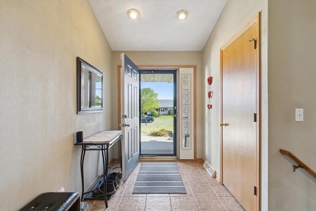 605 E Rime St, Orfordville, WI 53576 - entrance foyer featuring light tile patterned floors and baseboards