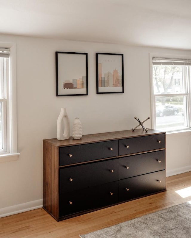 6935 N Yates Rd, Fox Point, WI 53217 - detailed view of wood finished floors and baseboards
