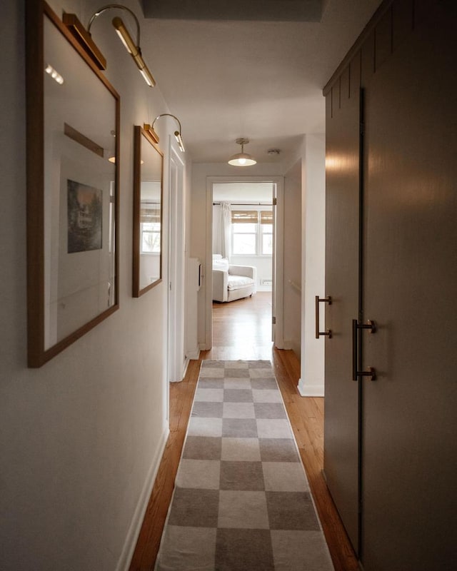6935 N Yates Rd, Fox Point, WI 53217 - hall with light wood finished floors and baseboards
