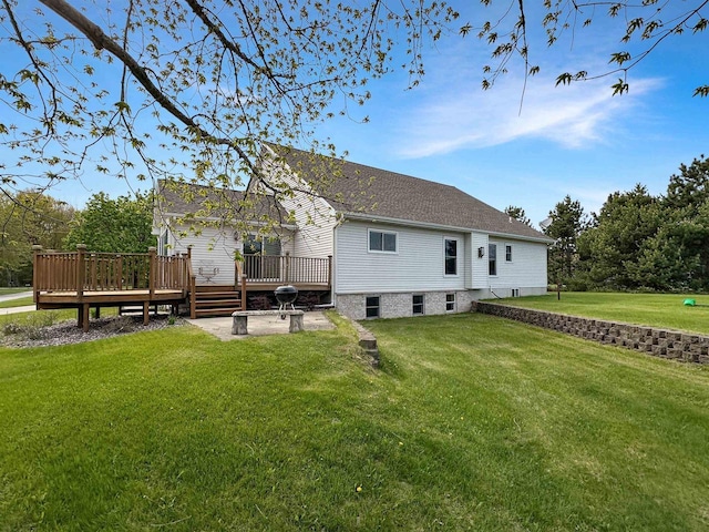 N2242 Keller Rd, Marinette, WI 54143 - rear view of house with a deck, a lawn, and a shingled roof