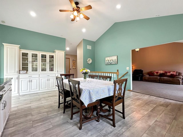 N2242 Keller Rd, Marinette, WI 54143 - dining space featuring ceiling fan, high vaulted ceiling, recessed lighting, and light wood-style floors