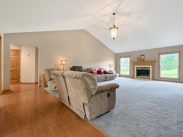 N2242 Keller Rd, Marinette, WI 54143 - living room featuring vaulted ceiling and light wood-style floors