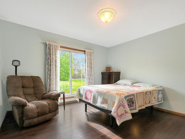 N2242 Keller Rd, Marinette, WI 54143 - bedroom featuring hardwood / wood-style flooring and baseboards