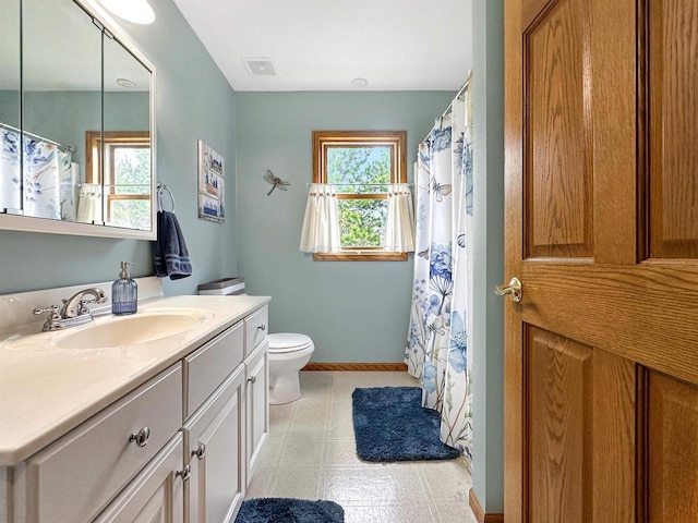 N2242 Keller Rd, Marinette, WI 54143 - bathroom with vanity, toilet, and baseboards