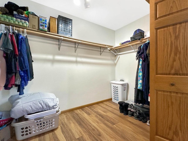N2242 Keller Rd, Marinette, WI 54143 - walk in closet with light wood-style floors