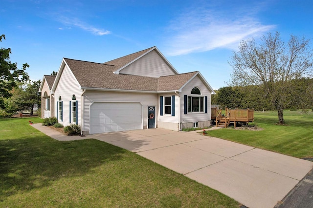 N2242 Keller Rd, Marinette, WI 54143 - view of front of house featuring a garage, driveway, a deck, and a front yard