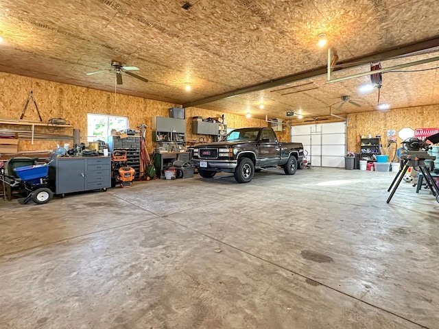 N2242 Keller Rd, Marinette, WI 54143 - garage with ceiling fan and a workshop area