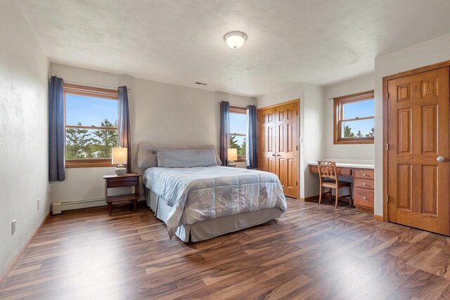 N3270 State Rd 76, Hortonville, WI 54944 - bedroom featuring wood finished floors, an office area, and baseboards