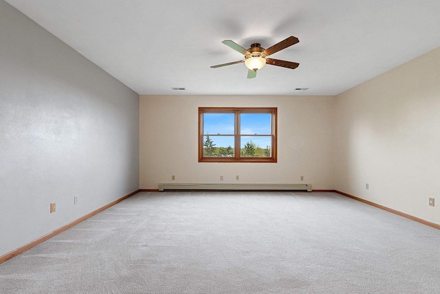 N3270 State Rd 76, Hortonville, WI 54944 - empty room with a baseboard heating unit, a ceiling fan, light colored carpet, and baseboards