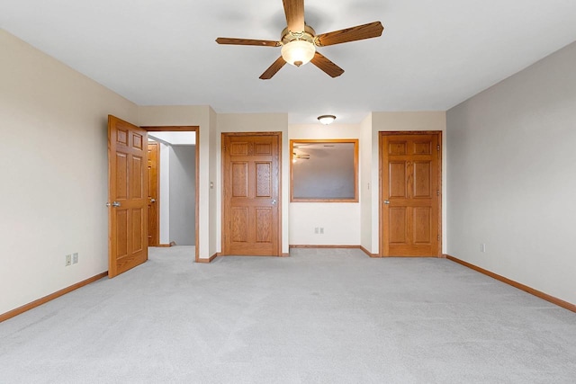 N3270 State Rd 76, Hortonville, WI 54944 - unfurnished bedroom featuring baseboards, light carpet, and ceiling fan