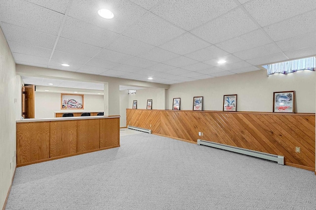 N3270 State Rd 76, Hortonville, WI 54944 - bar featuring a baseboard radiator, carpet floors, a drop ceiling, recessed lighting, and wooden walls