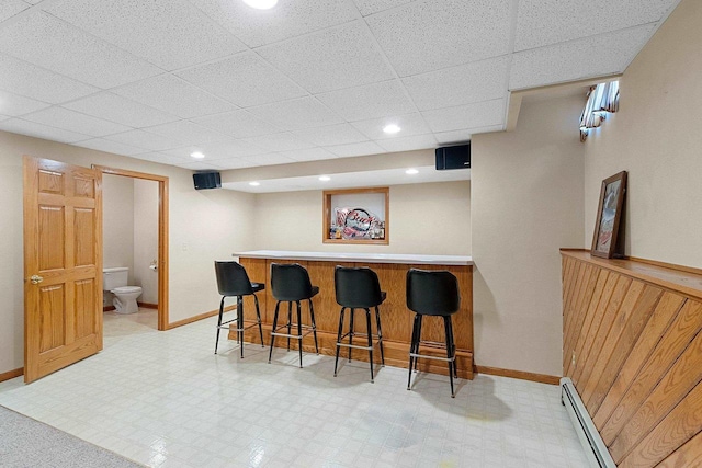 N3270 State Rd 76, Hortonville, WI 54944 - indoor bar with a paneled ceiling, a baseboard radiator, light floors, baseboards, and recessed lighting