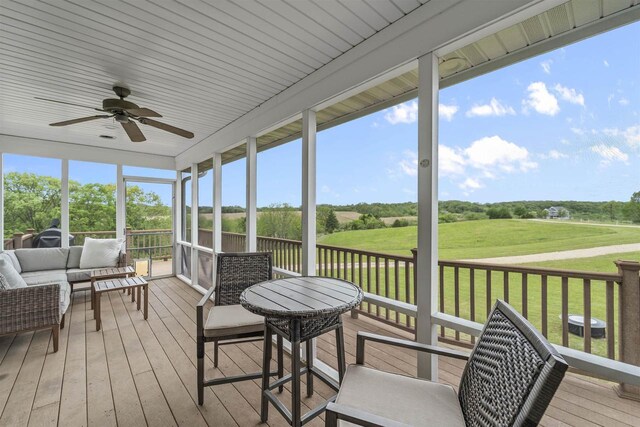 4230 Dalby Rd, Black Earth, WI 53515 - sunroom / solarium with ceiling fan, an outdoor hangout area, and view of golf course