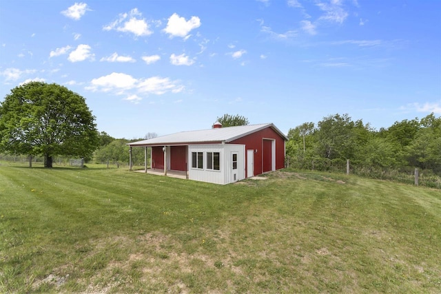 4230 Dalby Rd, Black Earth, WI 53515 - view of grassy yard with an outbuilding, an outdoor structure, and a detached garage