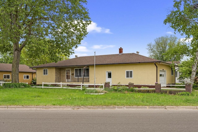 2530 Onalaska Ave, La Crosse, WI 54603 - single story home with stucco siding and a chimney