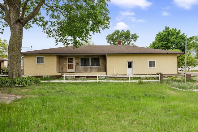 2530 Onalaska Ave, La Crosse, WI 54603 - rear view of property with stucco siding and a chimney