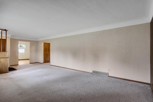 2530 Onalaska Ave, La Crosse, WI 54603 - spare room featuring light colored carpet and baseboards