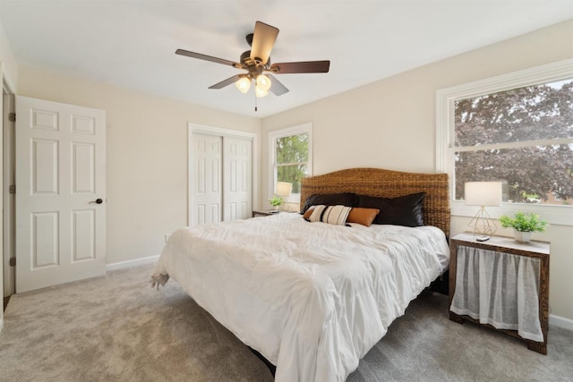 1089 Audrey Ct, North Fond Du Lac, WI 54937 - carpeted bedroom with a closet, baseboards, and a ceiling fan