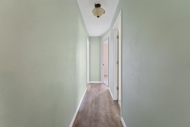 1089 Audrey Ct, North Fond Du Lac, WI 54937 - hallway featuring baseboards and dark wood-style floors