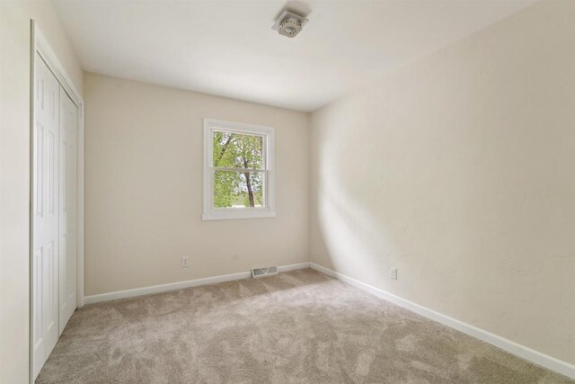 1089 Audrey Ct, North Fond Du Lac, WI 54937 - unfurnished bedroom featuring carpet floors, baseboards, and a closet