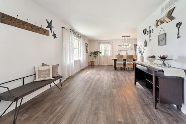 1089 Audrey Ct, North Fond Du Lac, WI 54937 - sitting room with wood finished floors, a chandelier, and baseboards