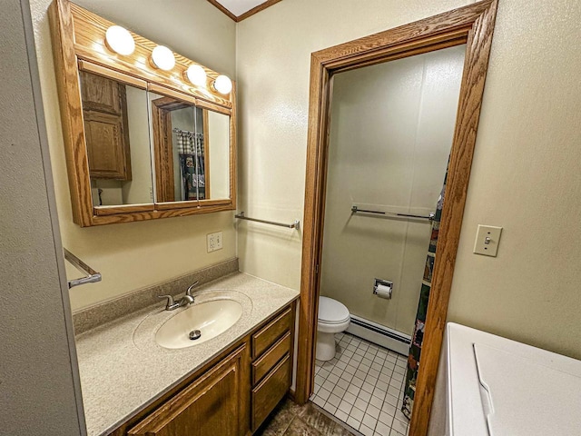 1200 4th Ave N, Park Falls, WI 54552 - bathroom featuring a baseboard heating unit, tile patterned flooring, vanity, and toilet