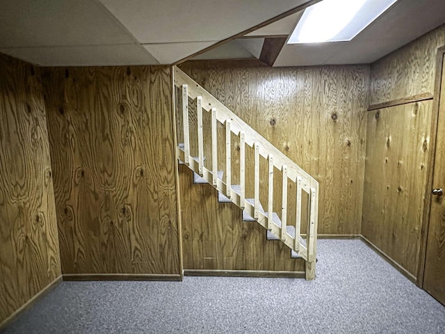 1200 4th Ave N, Park Falls, WI 54552 - stairs featuring wooden walls and carpet flooring