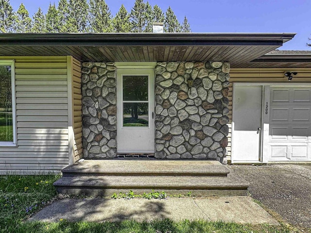 1200 4th Ave N, Park Falls, WI 54552 - doorway to property featuring stone siding