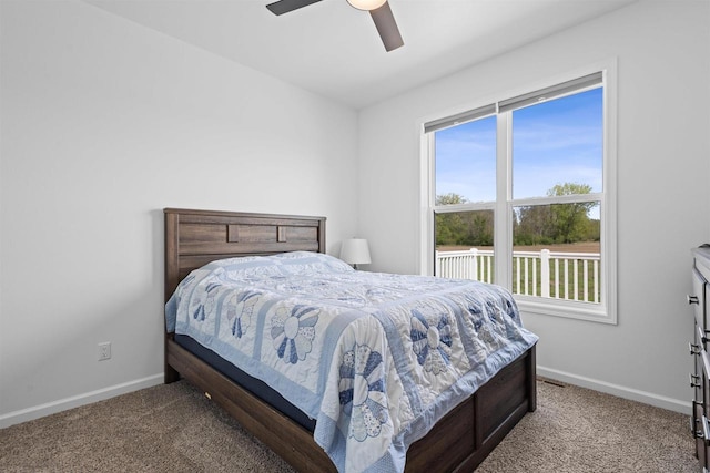 1150 S Bay Shore Rd, Brussels, WI 54204 - carpeted bedroom featuring baseboards and a ceiling fan