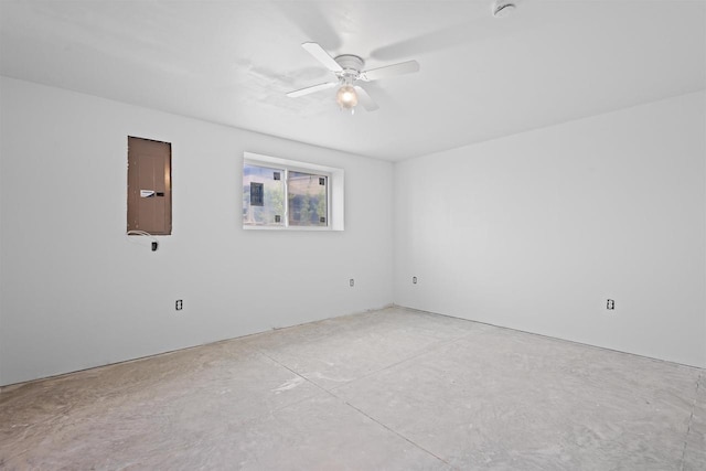 1150 S Bay Shore Rd, Brussels, WI 54204 - unfurnished room featuring electric panel, concrete floors, ceiling fan, and a smoke detector
