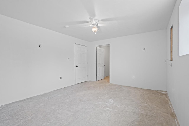 1150 S Bay Shore Rd, Brussels, WI 54204 - unfurnished room featuring ceiling fan and unfinished concrete flooring
