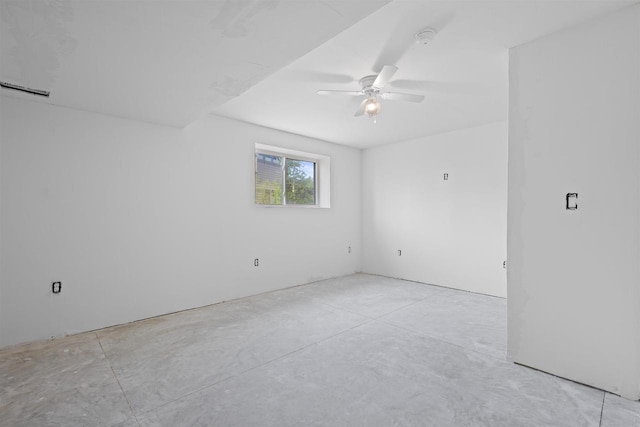 1150 S Bay Shore Rd, Brussels, WI 54204 - spare room with ceiling fan, concrete flooring, and a smoke detector