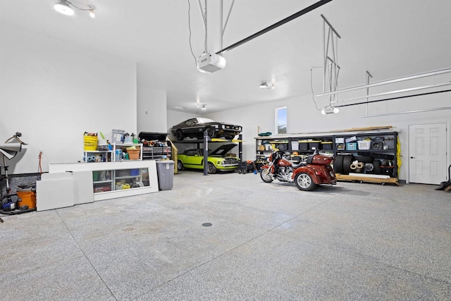 1150 S Bay Shore Rd, Brussels, WI 54204 - garage featuring a garage door opener