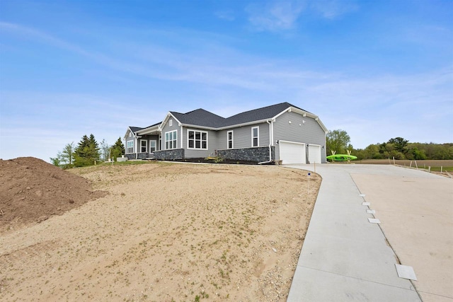 1150 S Bay Shore Rd, Brussels, WI 54204 - single story home with an attached garage and concrete driveway