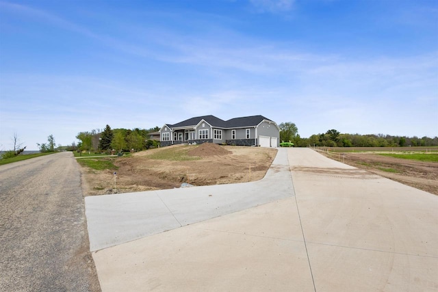 1150 S Bay Shore Rd, Brussels, WI 54204 - view of front of home with an attached garage and driveway