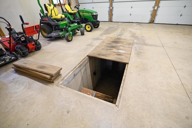 6460 Shady Bend Rd, Verona, WI 53593 - entry to storm shelter featuring a garage