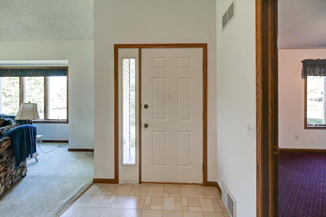6460 Shady Bend Rd, Verona, WI 53593 - foyer with light carpet and baseboards
