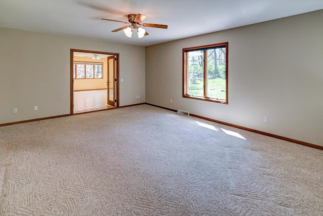 6460 Shady Bend Rd, Verona, WI 53593 - carpeted spare room with ceiling fan and baseboards