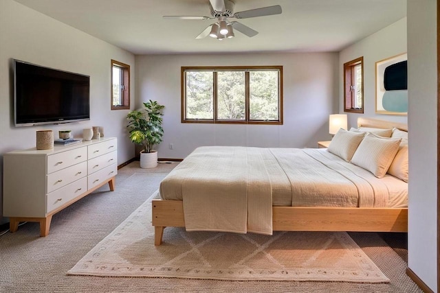 6460 Shady Bend Rd, Verona, WI 53593 - bedroom with light colored carpet, ceiling fan, and baseboards